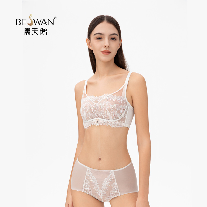 Black machined steel pen with hexagonal grip and small white logo at top.